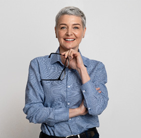 Confident, mature businesswoman against neutral background