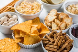 Variety of crunchy snacks that should be avoided after dental implant surgery 
