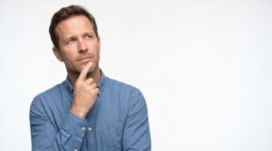 Man wearing curious, thoughtful expression