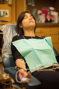 Dental patient with IV in her arm